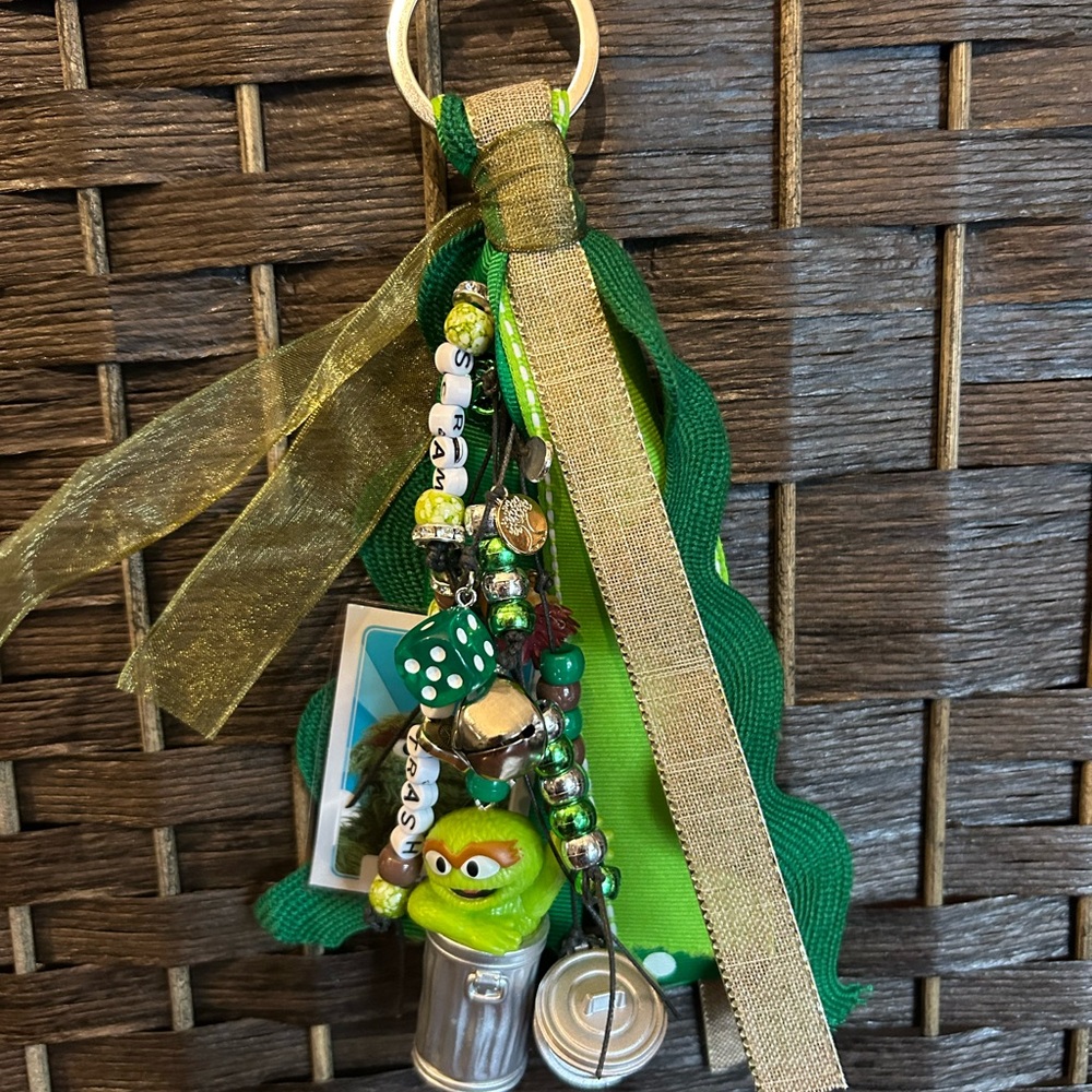 Charming Bag Charm featuring “Oscar The Grouch”